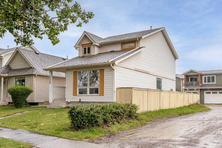 Property Photo: 2320 Woodview Drive SW AB T2W 4X6