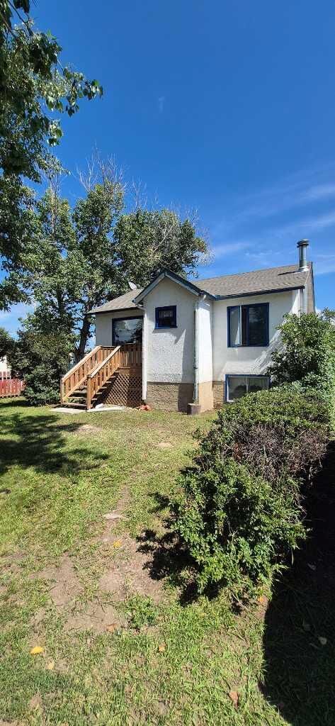 Property Photo:  209 Main Street  AB T0M 0M0 