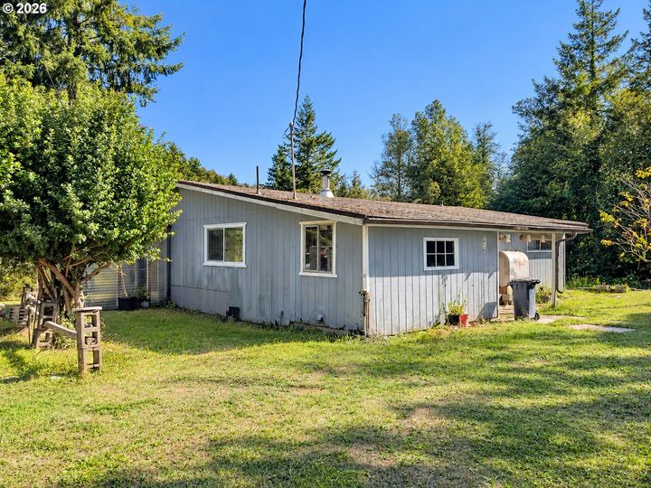 Property Photo:  99330 S Bank Chetco River Rd  OR 97415 