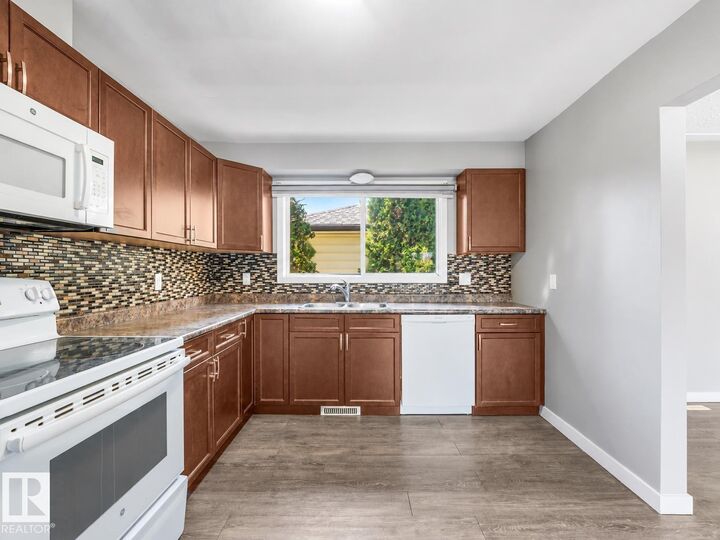 Property Photo:  13540 110 Street NW  AB T5E 4Z2 
