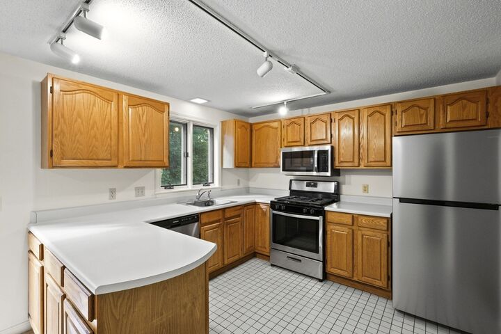 Property Photo:  55 Littleton Road 2E  MA 01432 