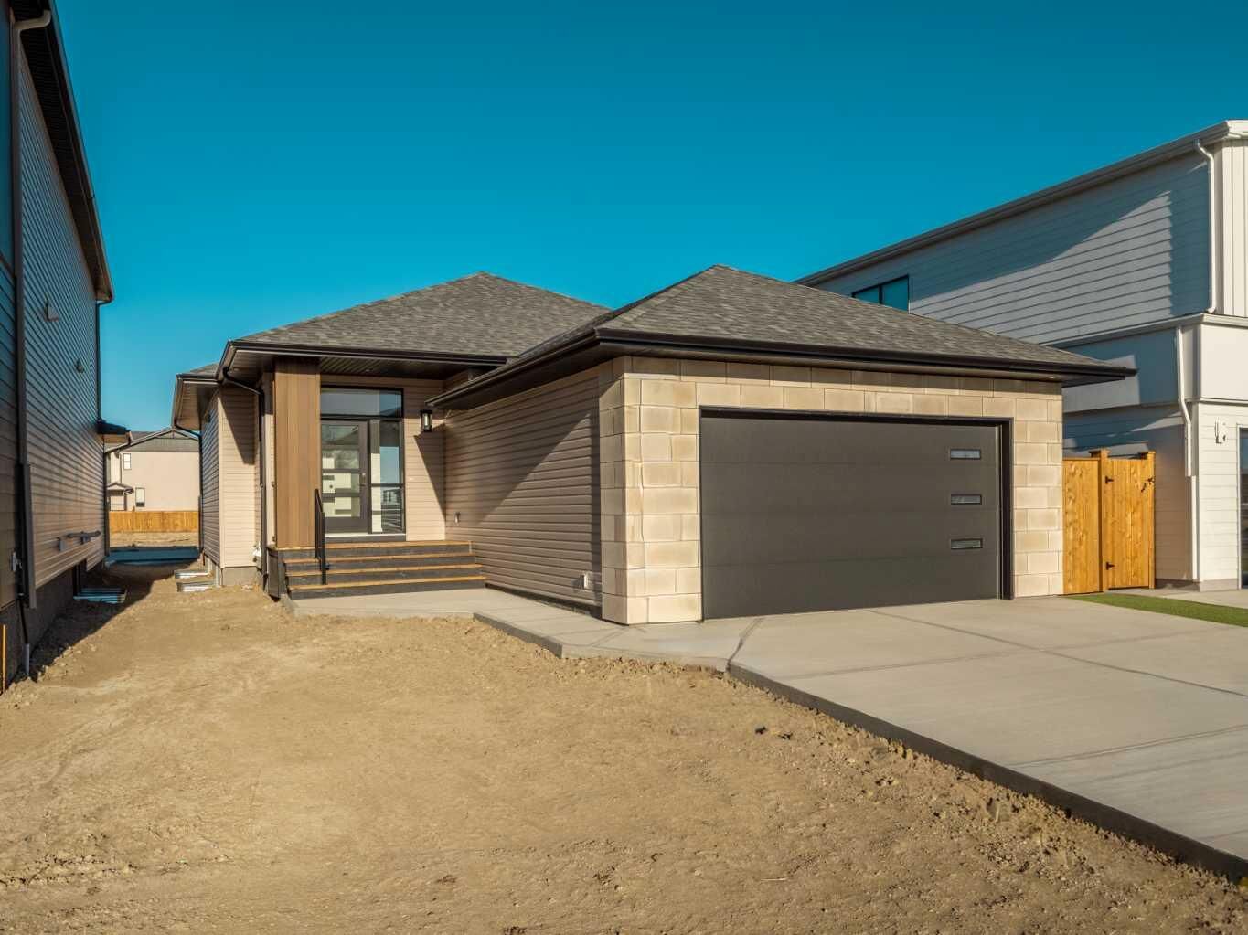 Property Photo:  425 Blackwolf Boulevard N  AB T1H 7J5 
