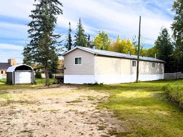 Property Photo:  1006 9 Avenue  AB T0G 2B0 