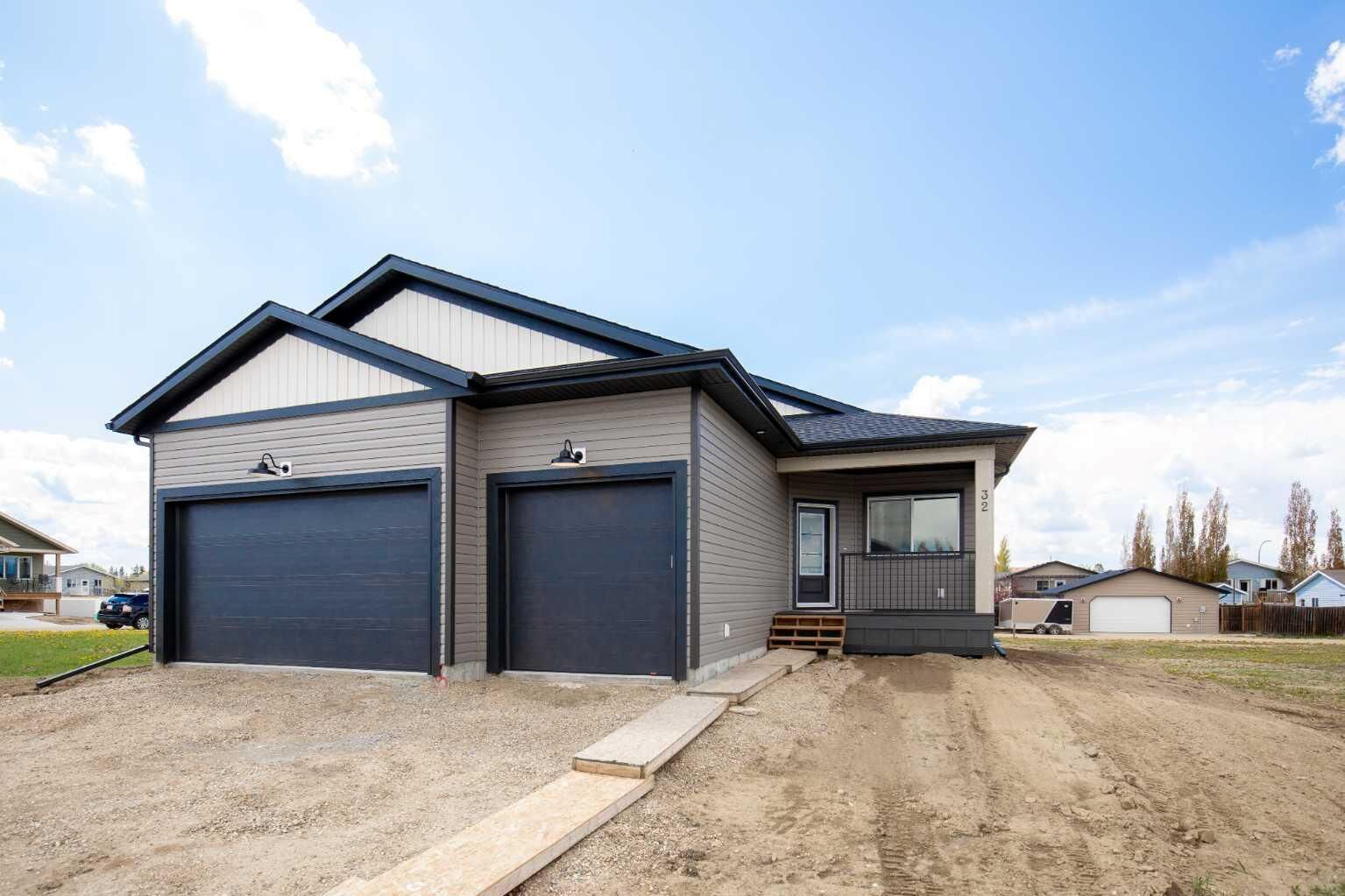 Property Photo:  32 Sunrise Crescent N  AB T0M 2A0 