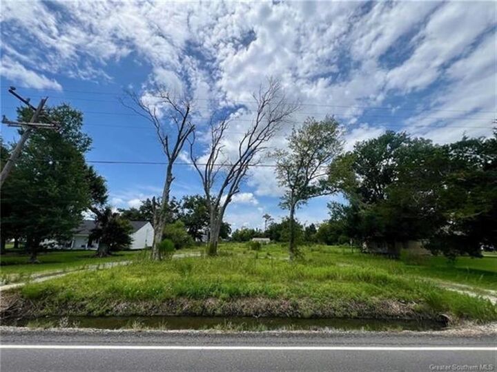 Property Photo:  1193 W Tank Farm Road W  LA 70605 