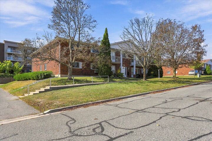 Property Photo: 2406 Mountland Drive 202 ON K9K 2E1