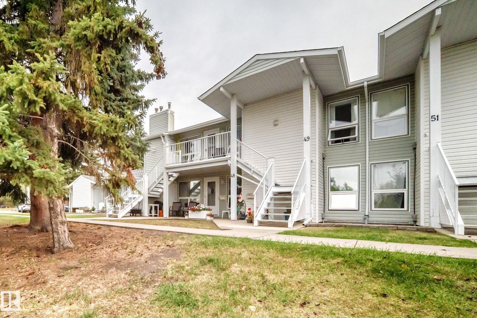 Property Photo:  2115 118 Street NW 49  AB T6J 5N1 
