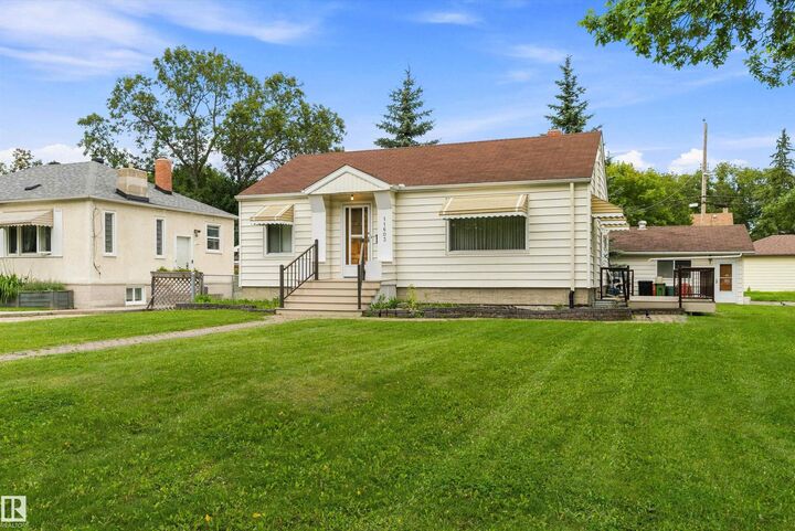 Property Photo:  11603 St Albert Trail NW  AB T5M 3L6 