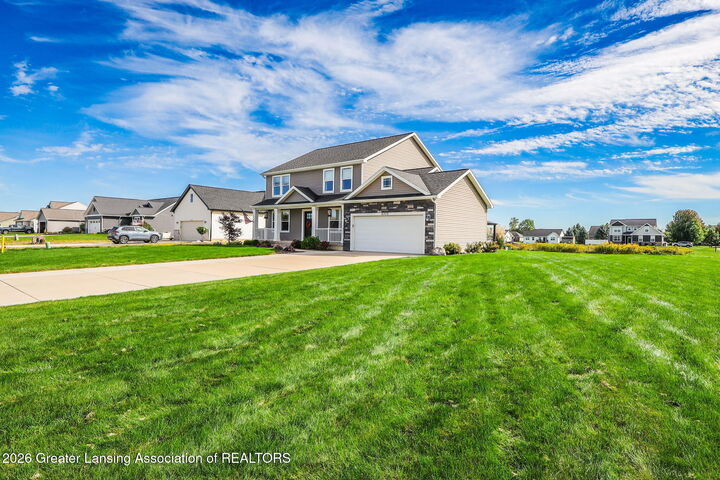 Property Photo:  2373 Winners Circle  MI 48879 