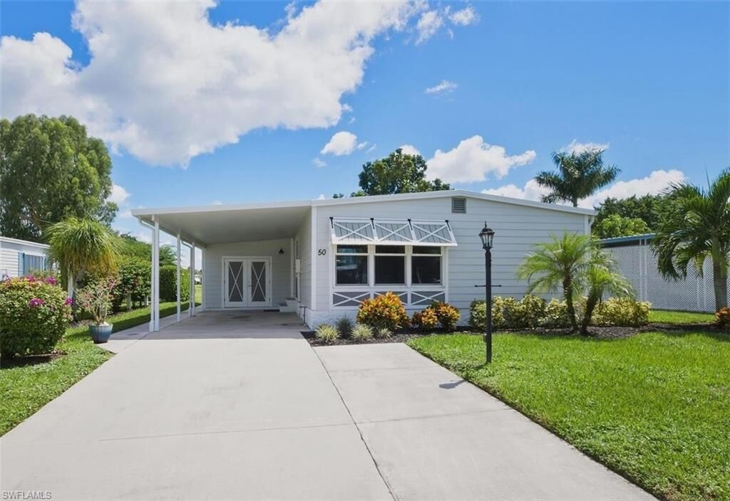 Property Photo:  50 Le Mans Dr  FL 34112 