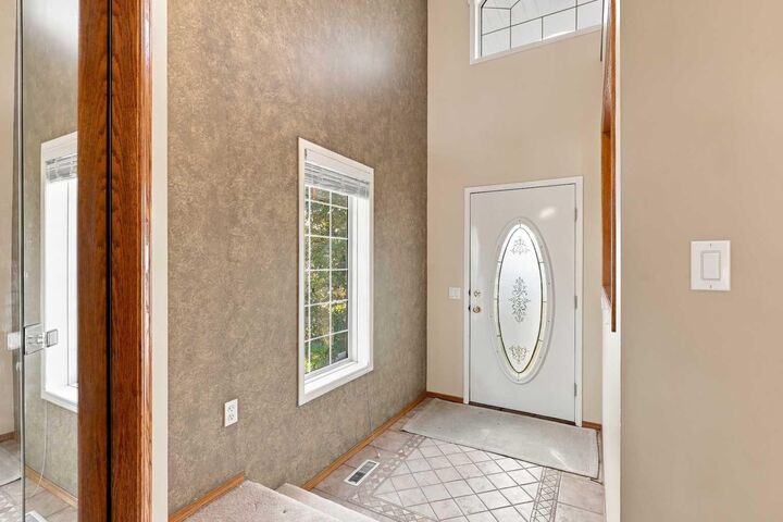 Property Photo:  25 Arbour Ridge Park NW  AB T3G 4C4 