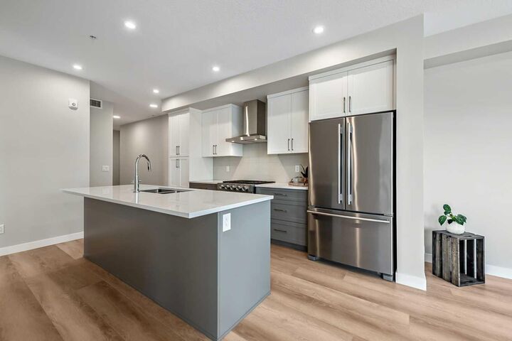 Property Photo:  100 Banister Drive 4110  AB T1S 5Y5 