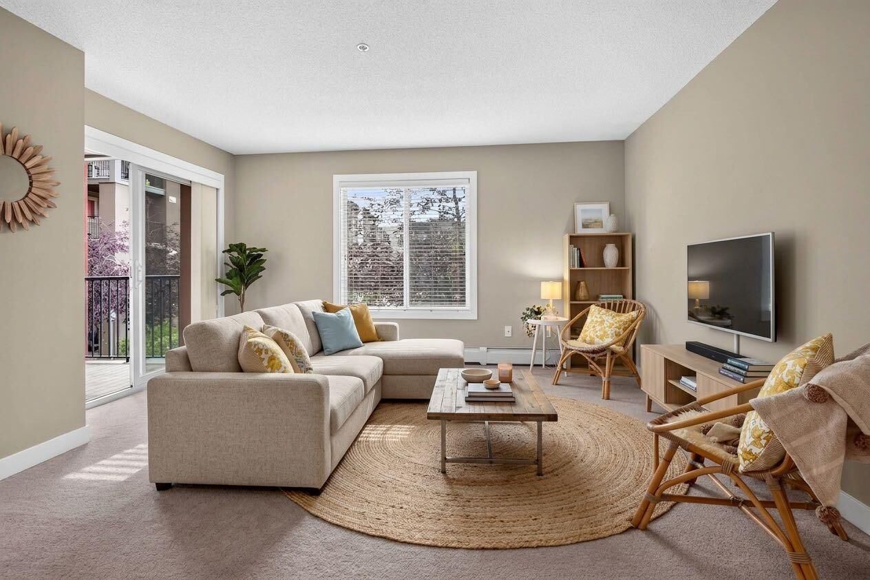 Property Photo: 403 Mackenzie Way SW 2206 AB T4B 3V7