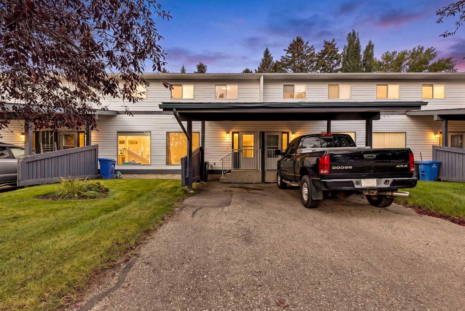 Property Photo:  107 Elm Place 105  AB T1S 1J1 