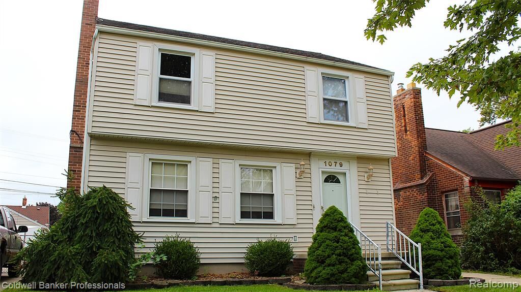 Property Photo:  1079 Riverbank Street  MI 48146 