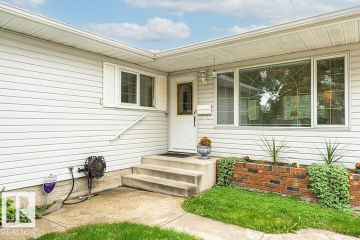 Property Photo:  9222 88 Street  AB T8L 1H3 