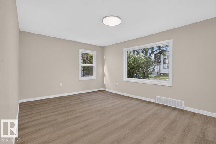 Property Photo:  11645 90 Street NW  AB T5B 3Y3 