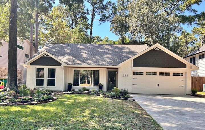 Property Photo:  235 S Pathfinders Circle  TX 77381 