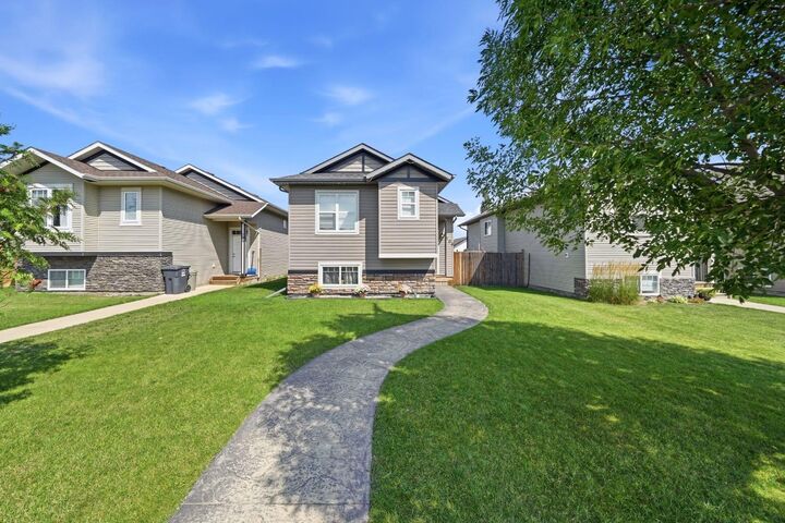 Property Photo:  106 25 Street  AB T4S 0J1 