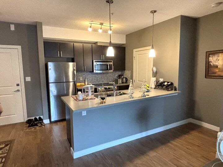 Property Photo:  11 Millrise Drive SW 212  AB T2Y 0K7 