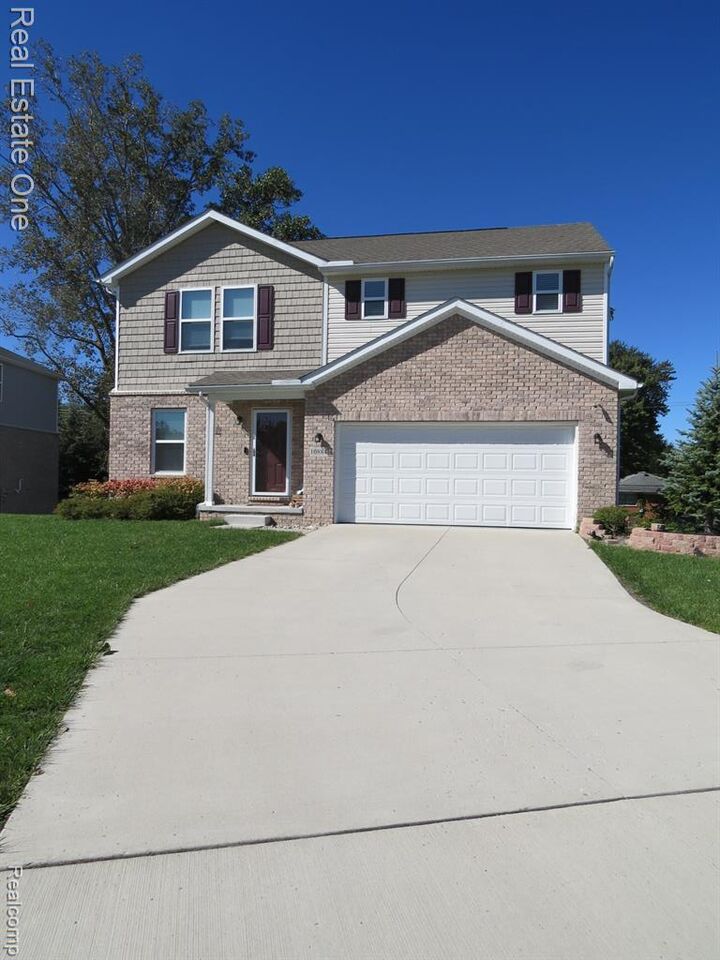 Property Photo:  10884 Island Lake Drive  MI 48180 