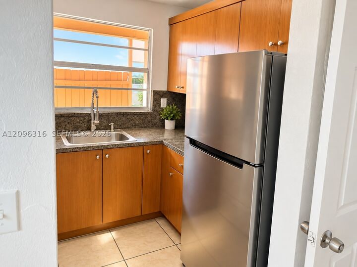 Property Photo:  6850 W 14th Ct B15  FL 33014 
