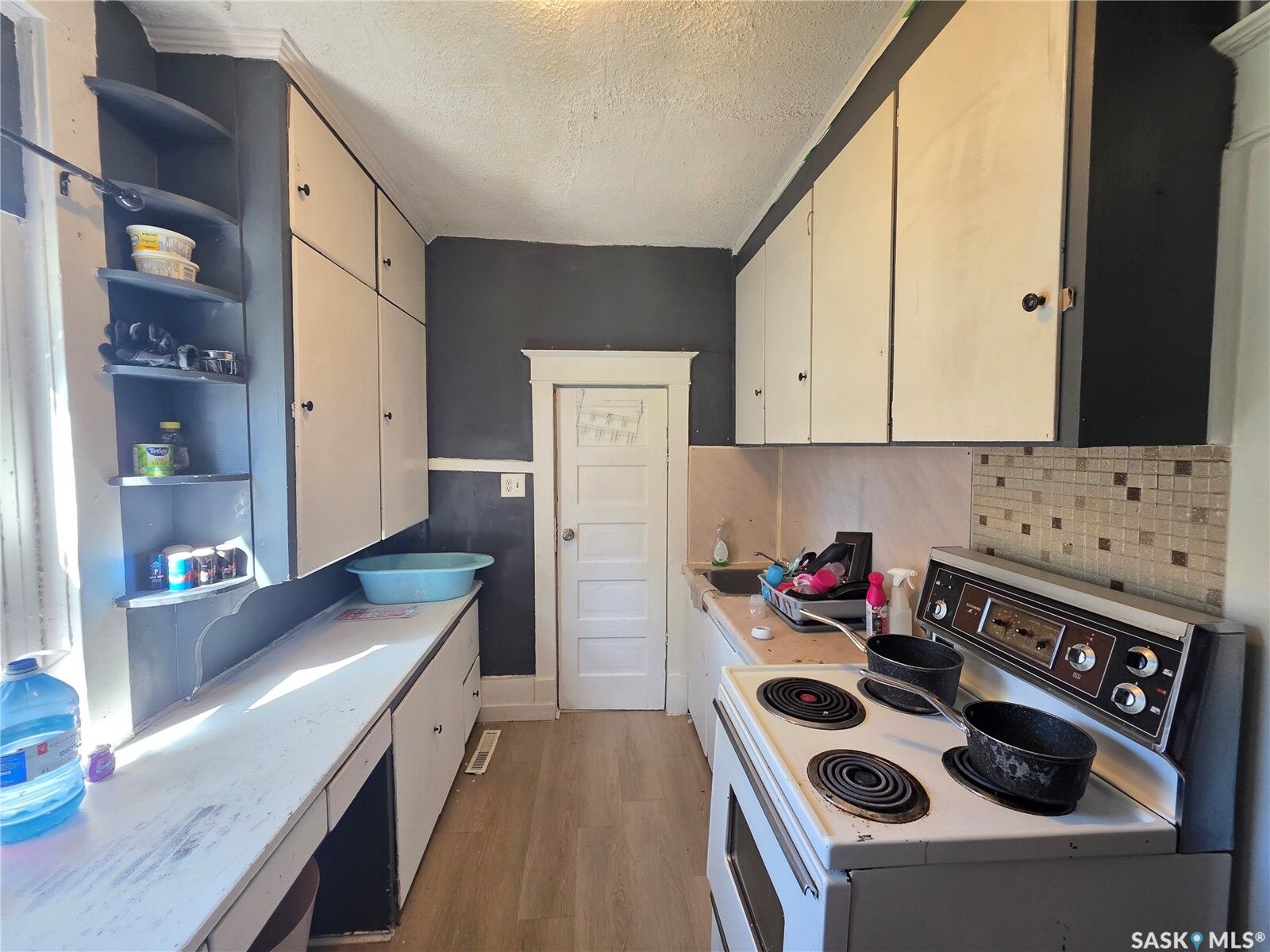 Property Photo:  1126 Robinson Street  SK S4T 2M9 