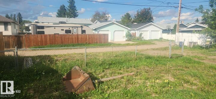 Property Photo:  4618B 45 Avenue  AB T9A 1Z7 