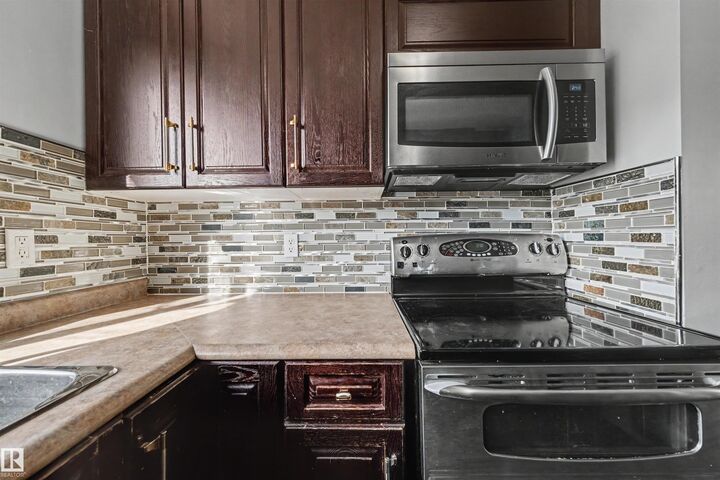 Property Photo:  12944 117 Street NW  AB T5E 5J7 