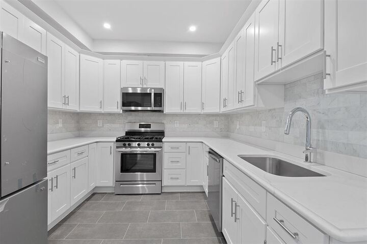 Property Photo: 311-315 West Side Ave 106 NJ 07305