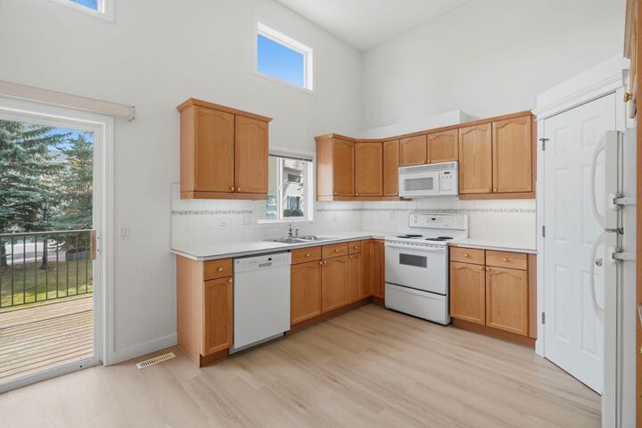 Property Photo: 23 Country Hills Cove NW AB T3K 5G7