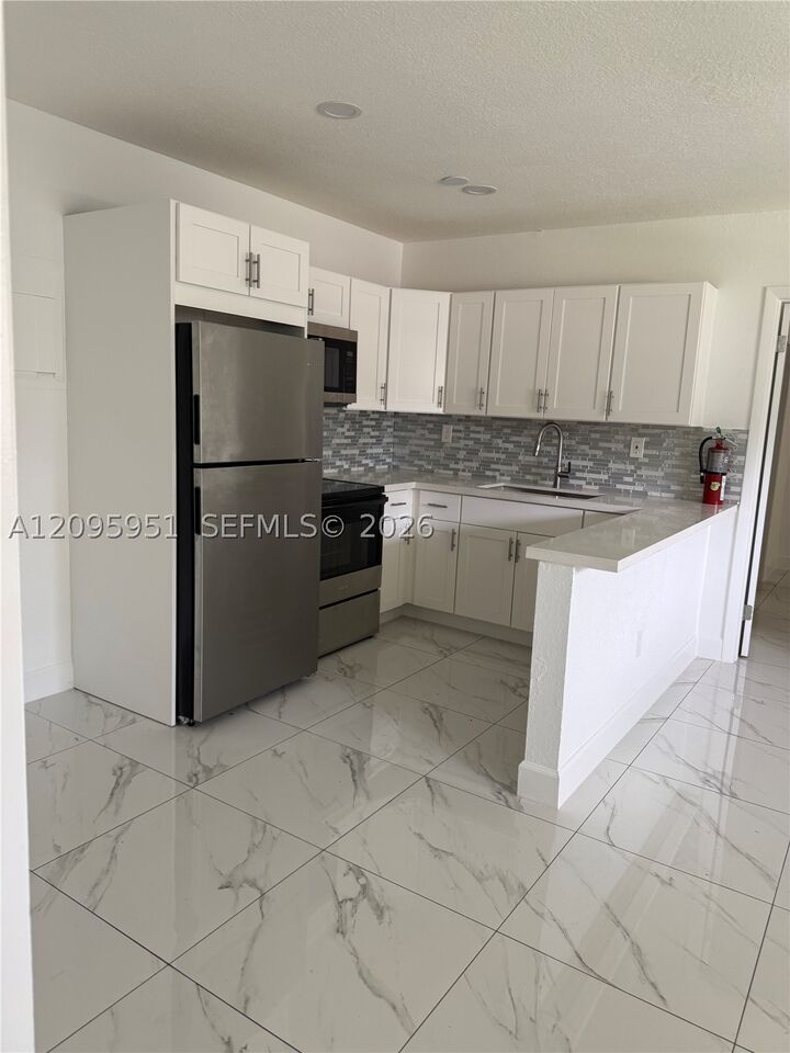 Property Photo: 8742 SW 145th St 8742 FL 33176