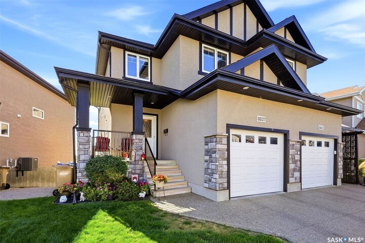 Property Photo: 8837 Kestral Drive SK S4Y 0C2