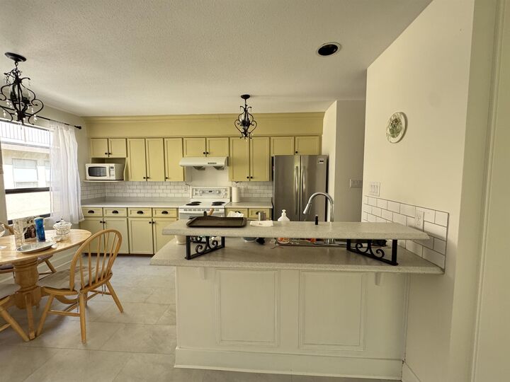 Property Photo:  7311 Moffatt 7  BC V6Y 1X9 