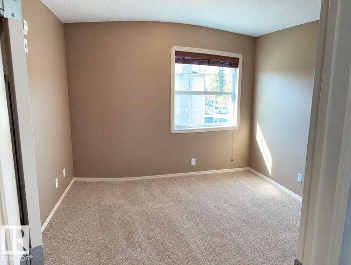 Property Photo:  4102 50 Avenue 304  AB T7A 0A3 