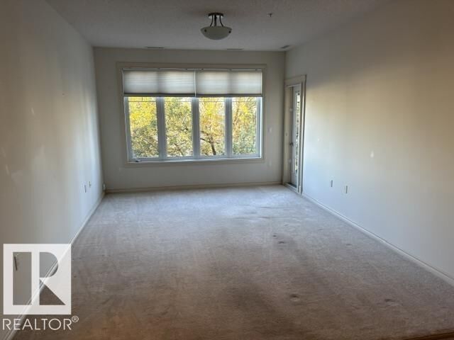 Property Photo: 9820 165 Street NW 325 AB T5P 0N3