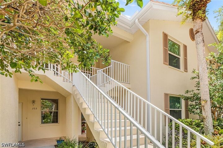 Property Photo:  305 Robin Hood Circle 204  FL 34104 