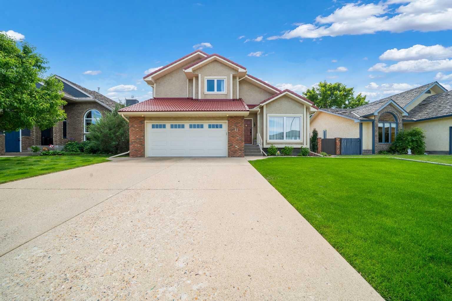 Property Photo: 11 Taylor Crescent SE AB T1B 3X5