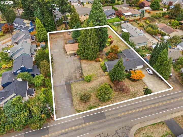 Property Photo:  8123 SE Roots Rd  OR 97267 