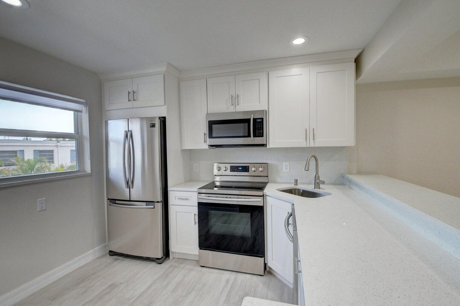 Property Photo:  398 W Camino Real 2  FL 33432 