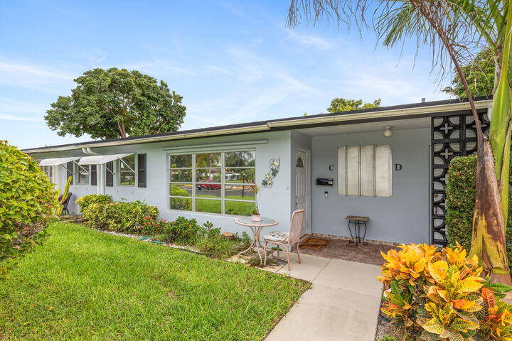 Property Photo:  420 High Point Drive C  FL 33445 