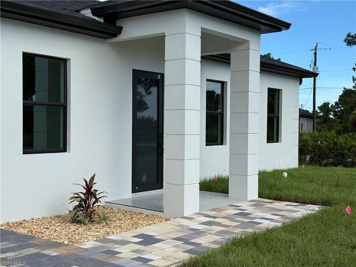 Property Photo:  824 Dawhert Ave S  FL 33974 
