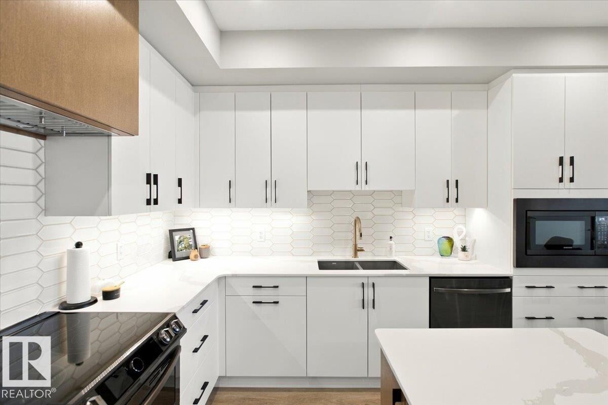 Property Photo:  7463 May Common NW 427  AB T6R 0X1 