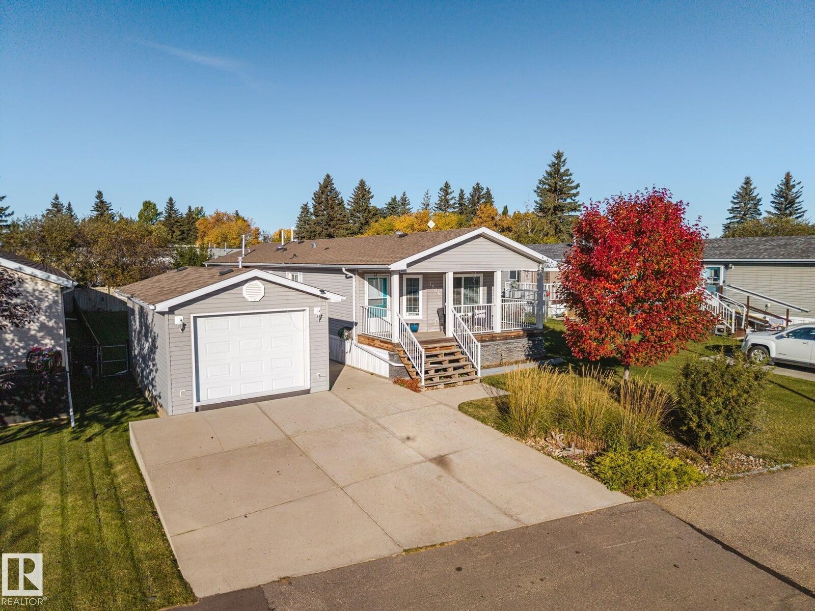 Property Photo:  53222 Range Road 272 1504  AB T7X 4M4 