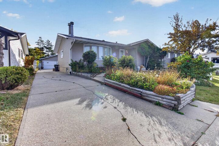 Property Photo:  13315 30 Street NW  AB T5A 3A1 