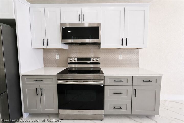 Property Photo: 4816/4818 24th Street SW FL 33973