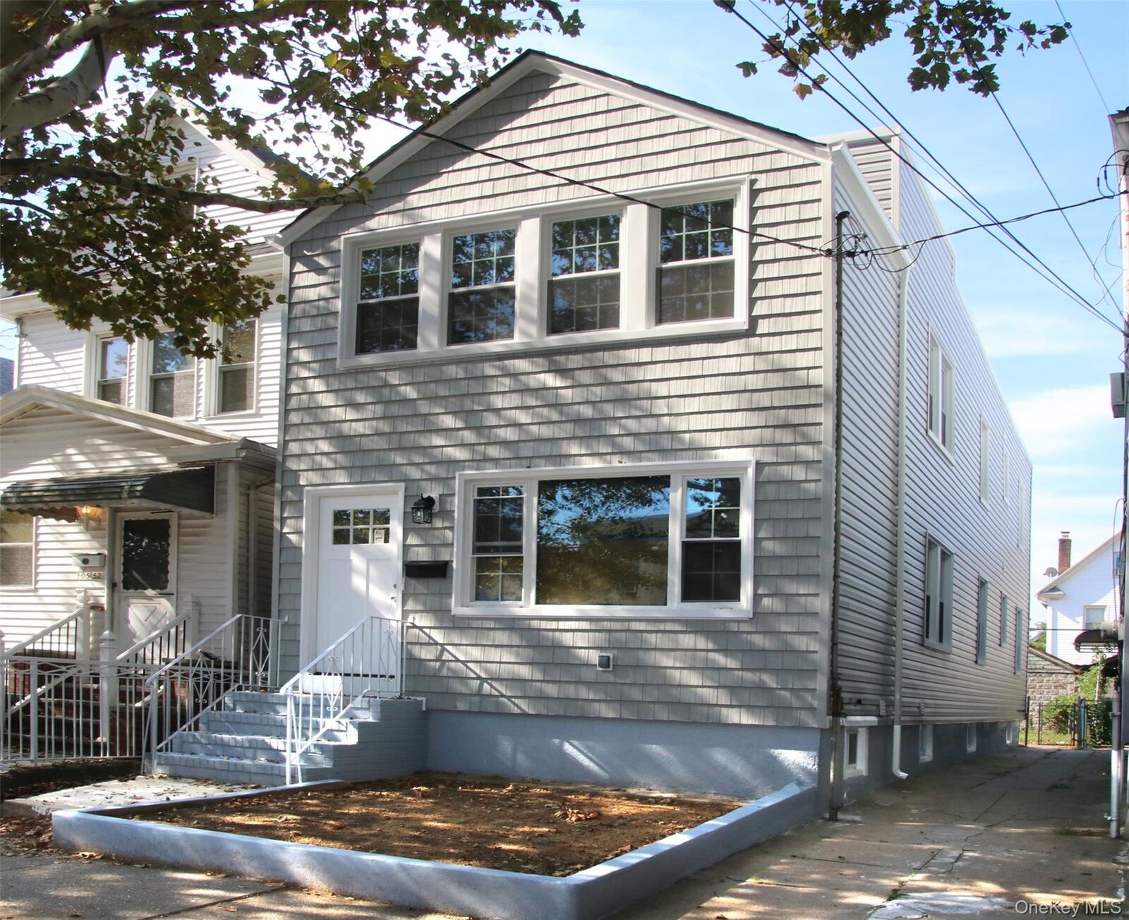 Property Photo:  105-48 89th Street  NY 11417 