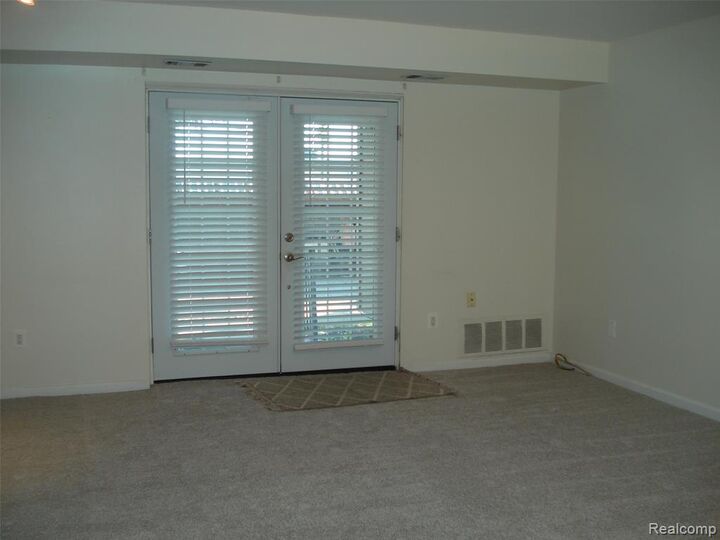 Property Photo:  30445 W Fourteen Mile Road 55  MI 48334 