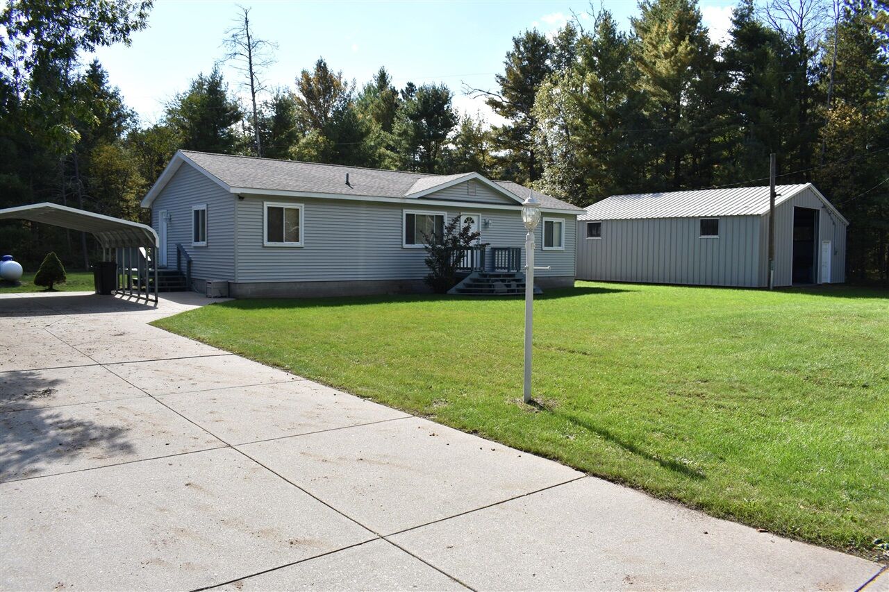 Property Photo:  3057 W 72nd Street  MI 49304-8922 