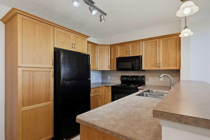 Property Photo:  380 Marina Drive 313  AB T1X 0B8 